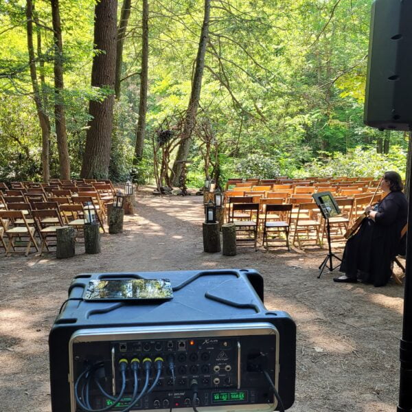 Audio mixer, speaker, microphones, and music source